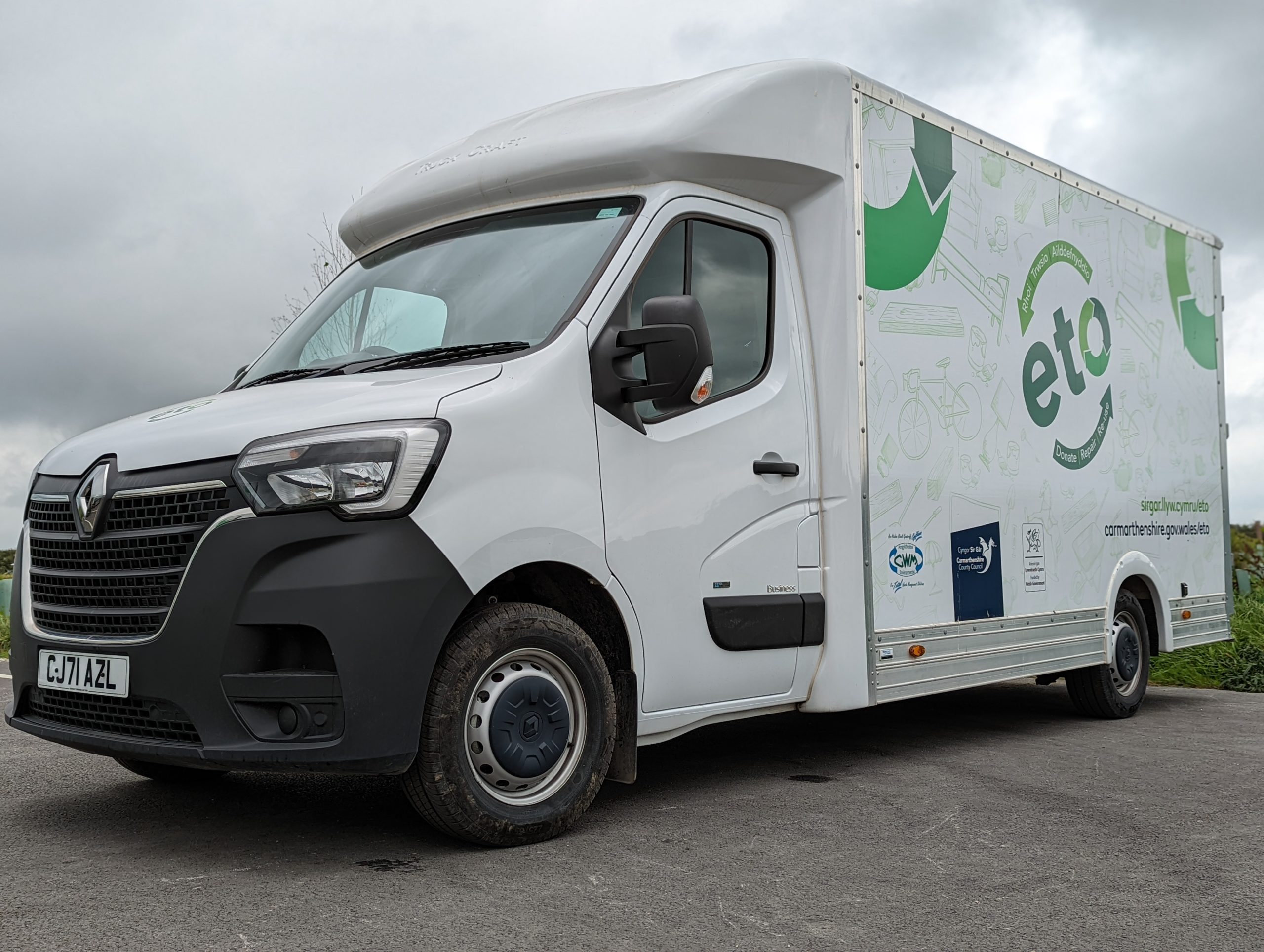 A white van with ETO written on the side in green