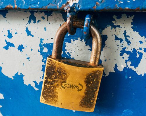 Padlock with CWM engraved on it