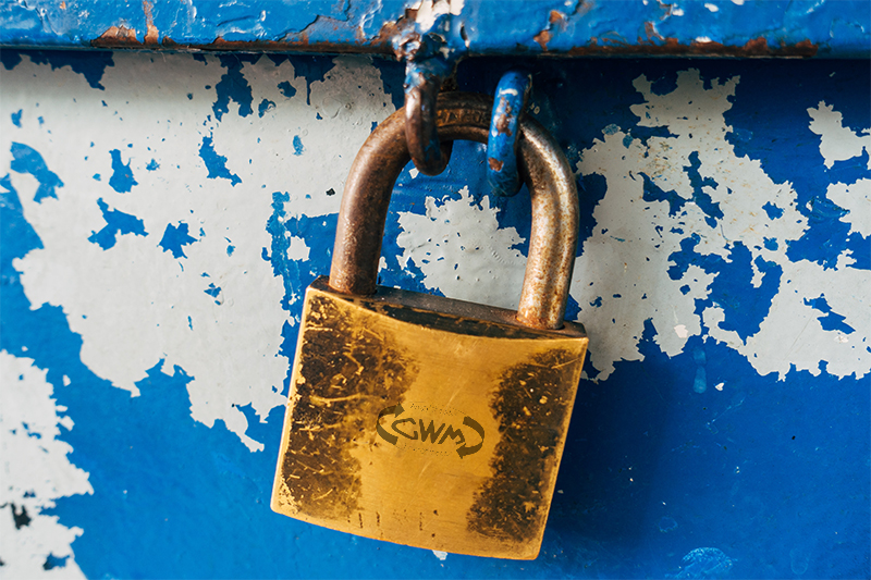 Padlock with CWM engraved on it